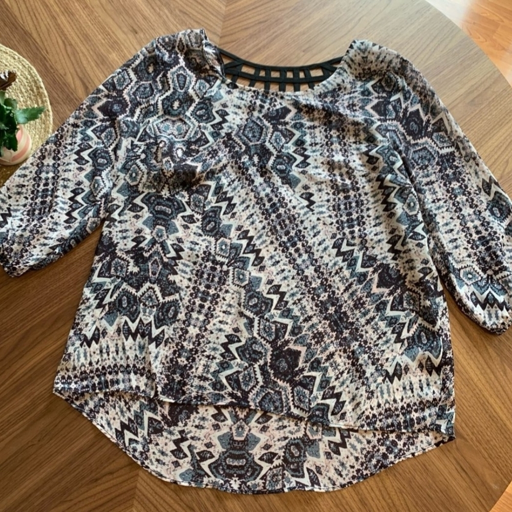 Maurice’s sheer blouse caged back detailing M